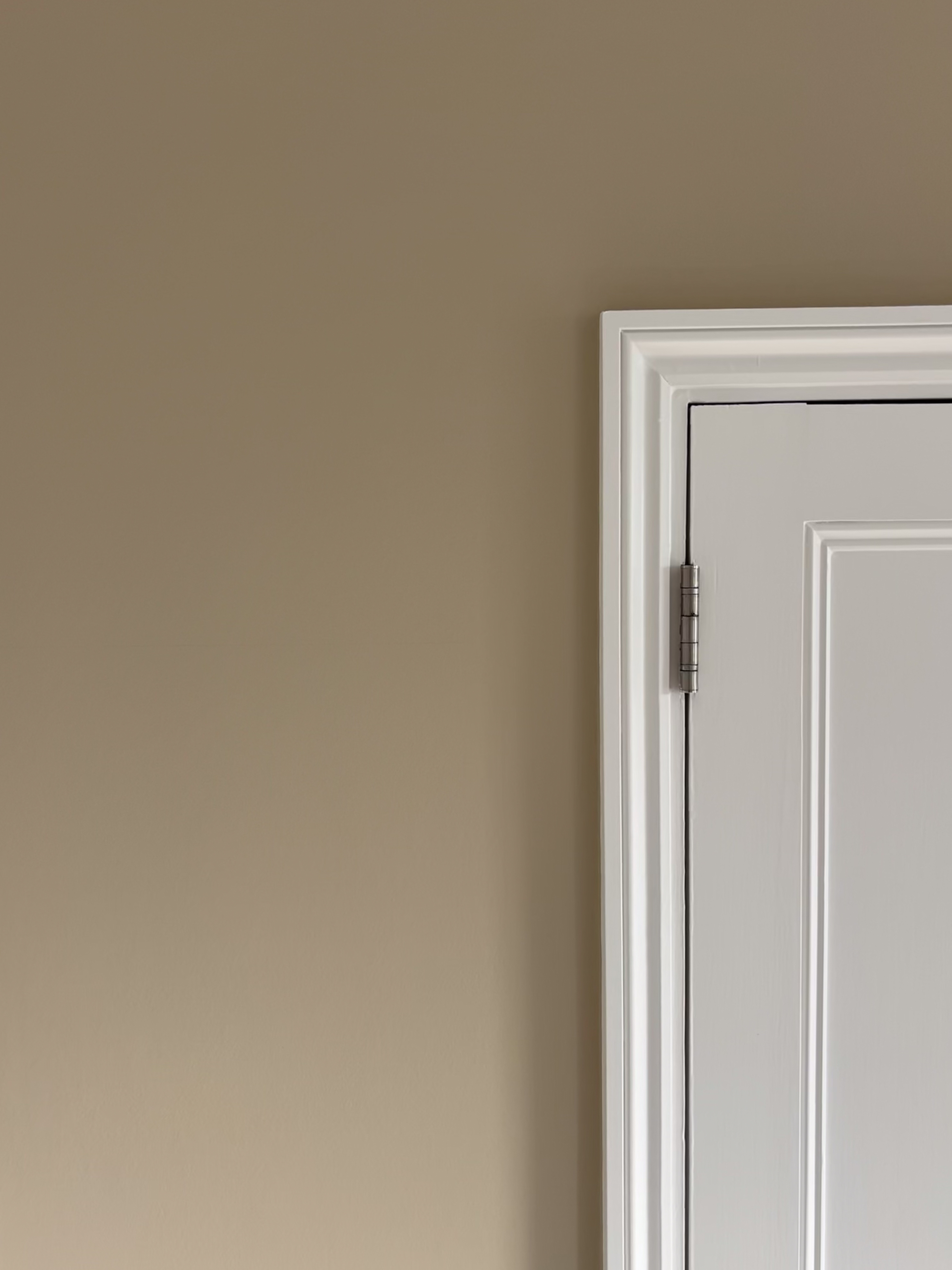 Detail of spray finish on door and walls by Flawless Decorators Jersey